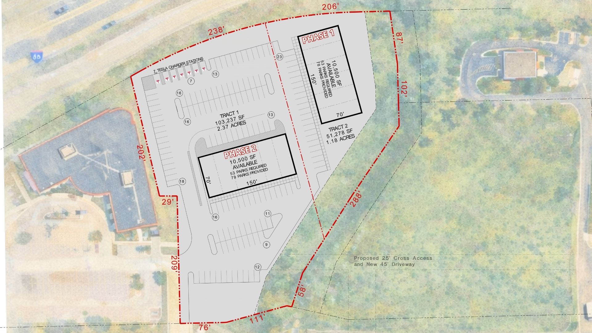 Aces District site plan showing Phase 1 and Phase 2 buildings, parking, and Tesla charger stations